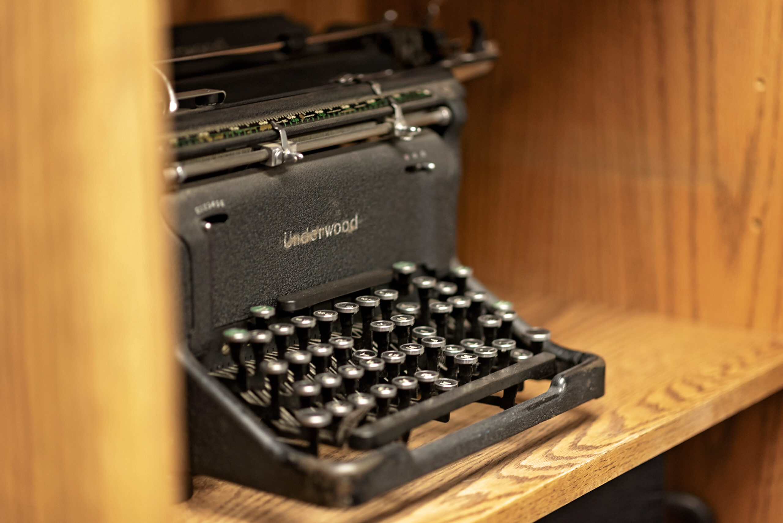 Old typewriter on a shelf